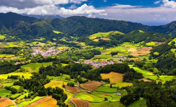 Aerial view of Lagoa das Furnas located on the Azorean island of Sao Miguel, Azores, Portugal. Lake Furnas (Lagoa das Furnas) on Sao Miguel, Azores, Portugal from the Pico do Ferro scenic viewpoint.