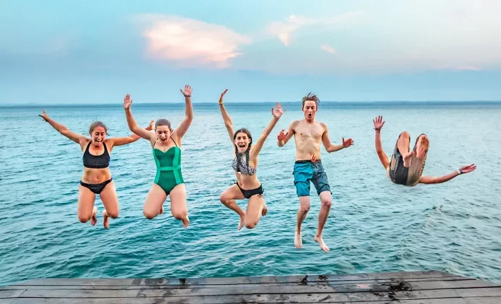 Guests Jumping Off of  Dock Belize