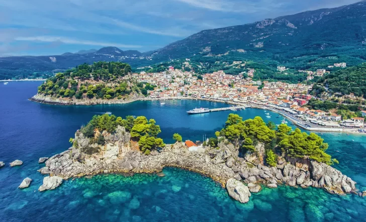 View of cottage lined islands in clear blue water