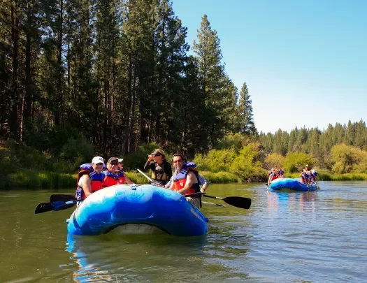 Group of guests in rafts.