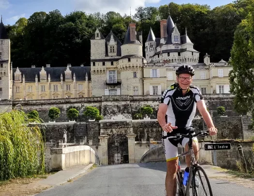 Guest Biking in Front of Castle