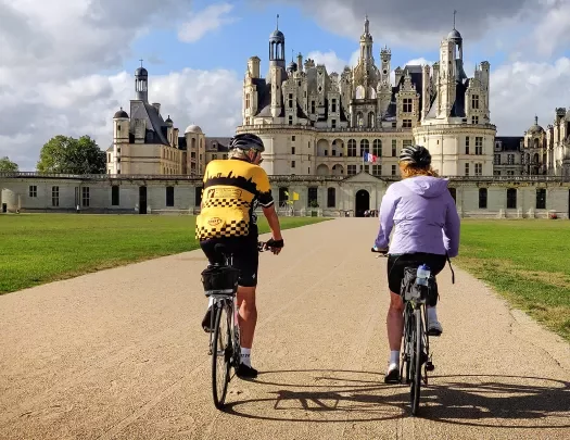 Two Backroads Guests Biking to Castle
