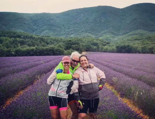 Three Backroads Guests Smiling in Lavender Field