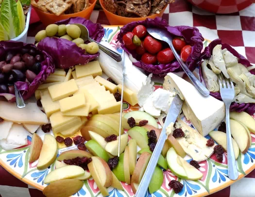 Charcuterie platter, apples, cheeses, salami, olives, etc.