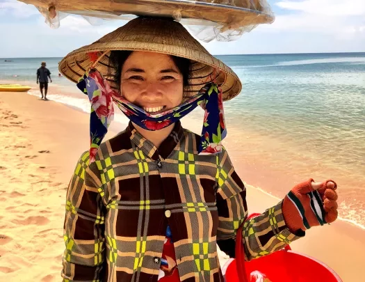 Local Vietnamese woman on the beach