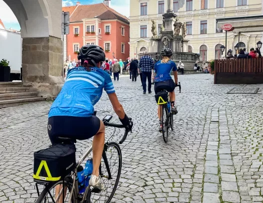 Bikers riding through a city in Czech Republic.
