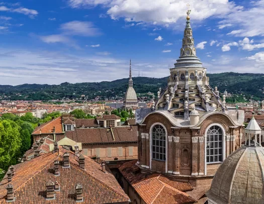 Shot of the Cappella della Sacra Sindone and it's surrounding town.