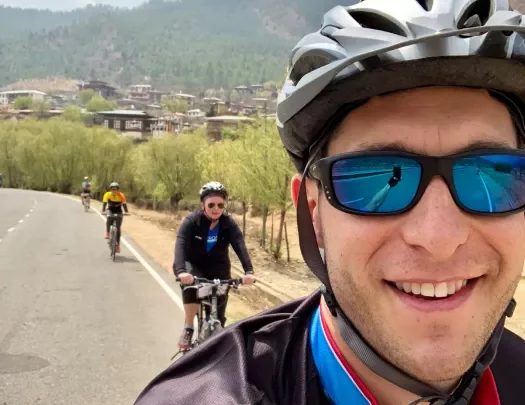 Bikers taking a selfie while riding in Bhutan