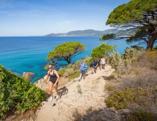 Group of backroads guests hiking along the coast in France