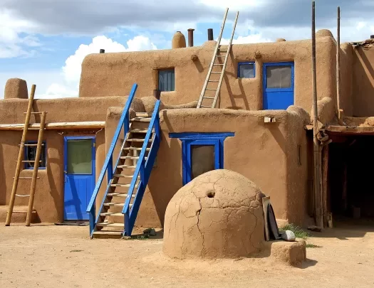 Orange clay structure with blue doors