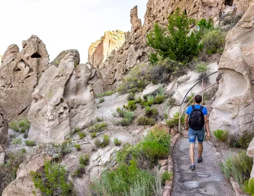 Hiker walking among rock formation