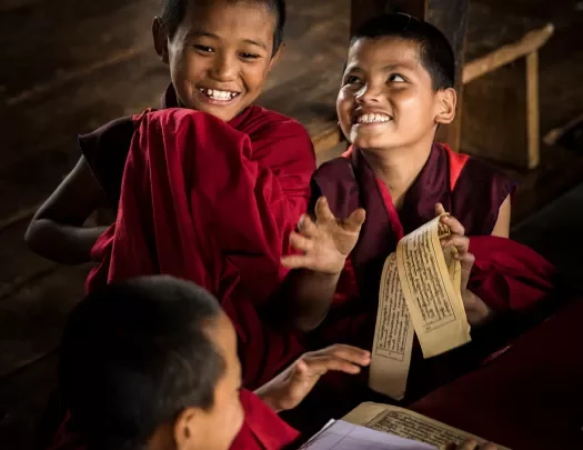 Laughing young monks in Bhutan