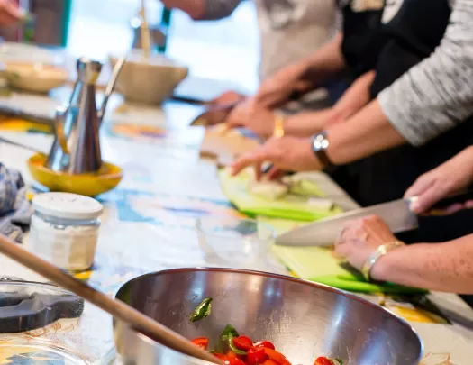 Close-up of guests at cooking class.