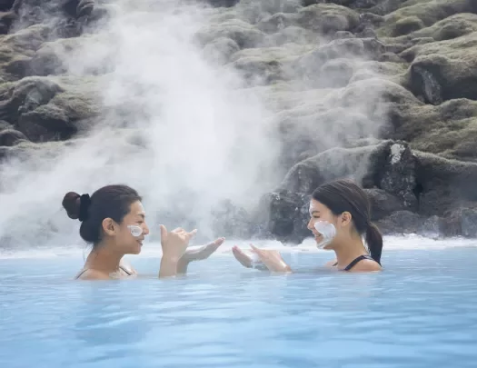 two guests floating in a hotspring