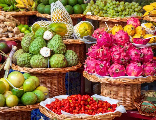 Vendor stall full of fruits and vegetables