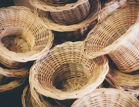 Piles of small weaved baskets