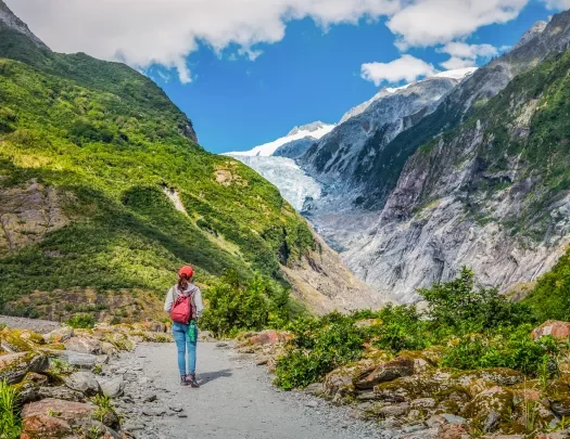 Hiker looking at a glacier