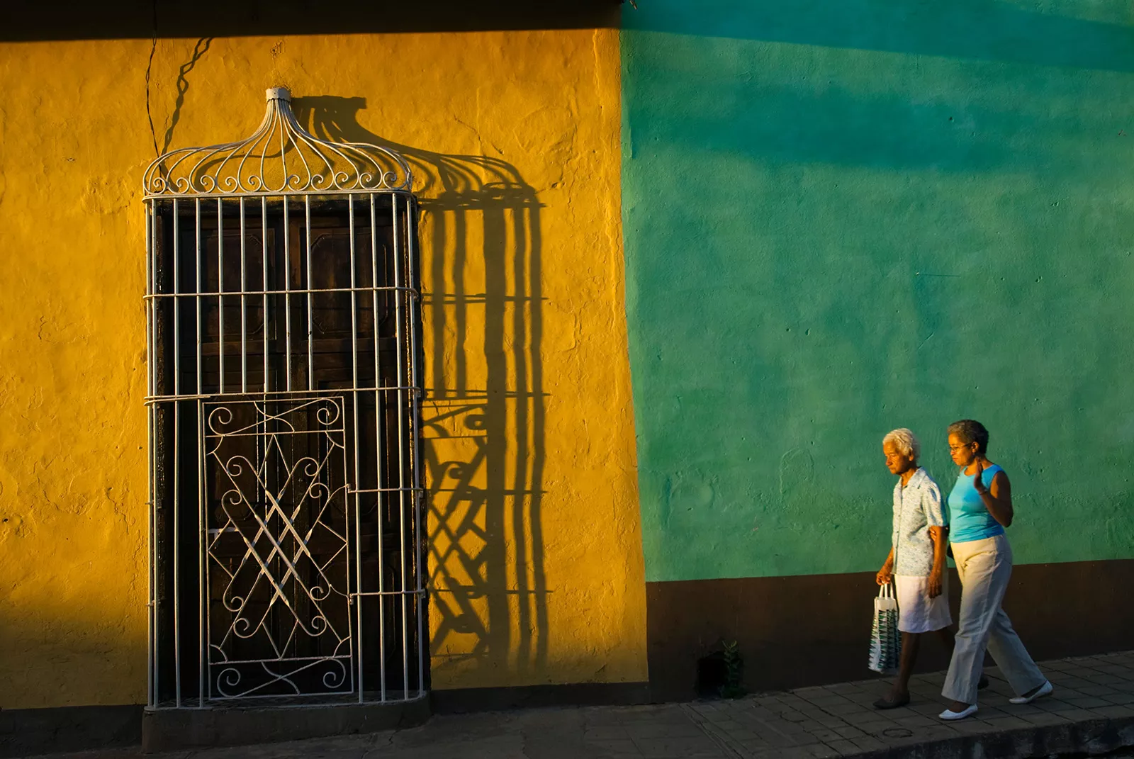 Locals Walking Sunset City Cuba