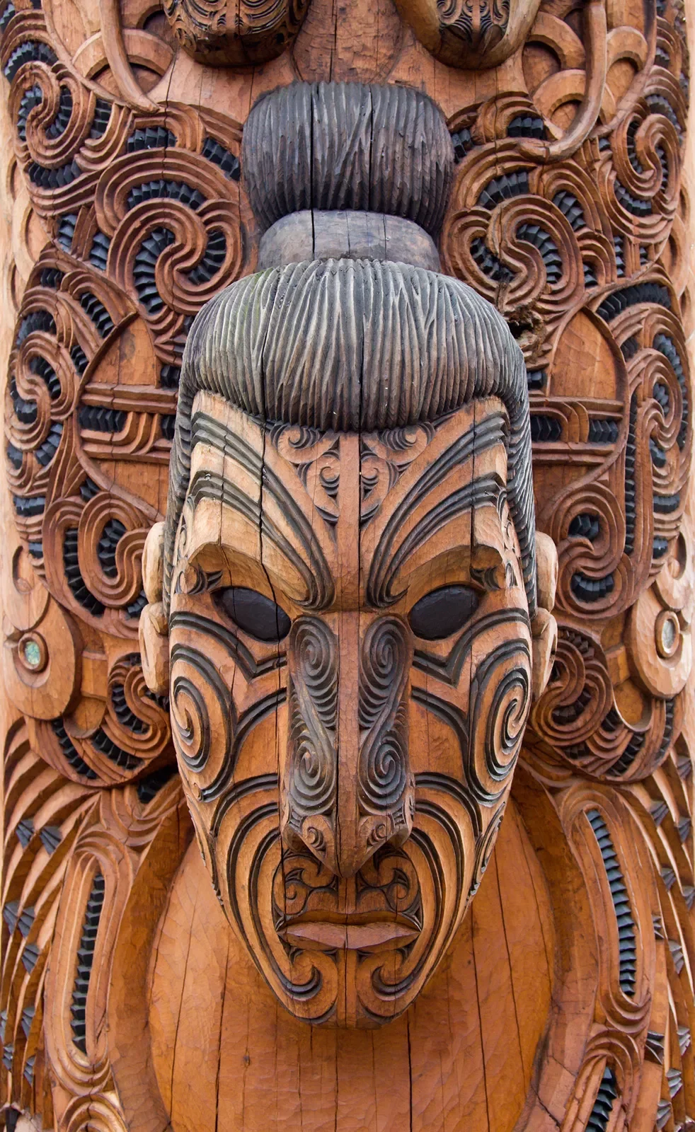 Close-up of Maori face carving.