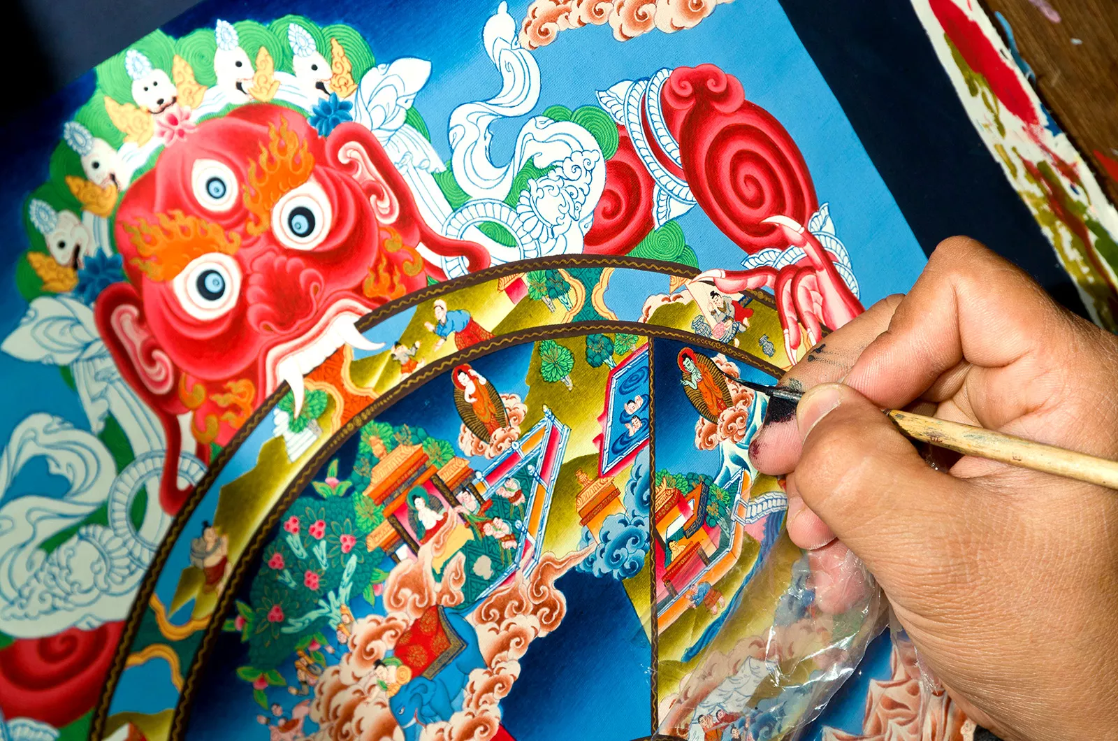 Artist Painting a Colorful Thangka in Kathmandu Valley