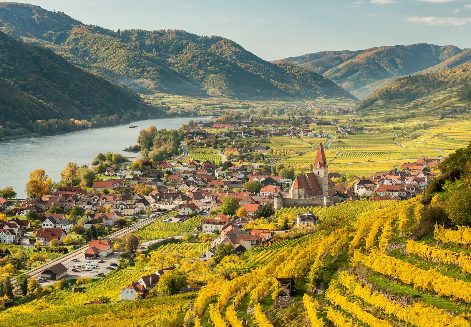 Hillside field overlooking a small town