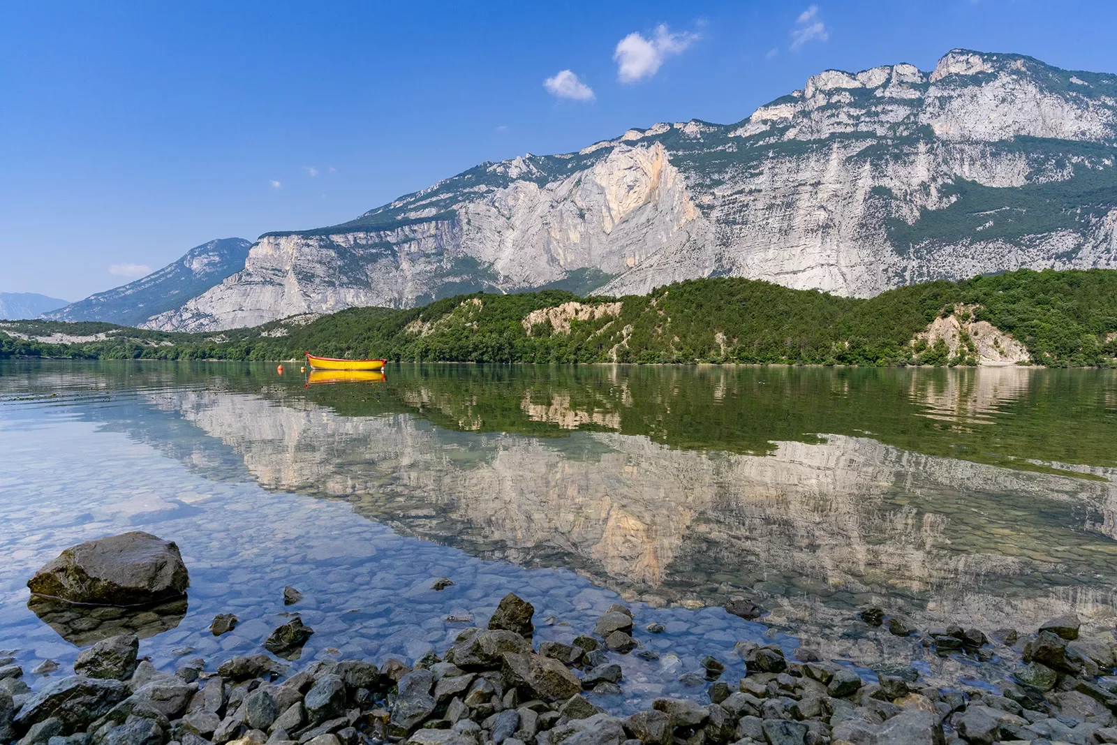 Yellow kayak in the middle of a lake