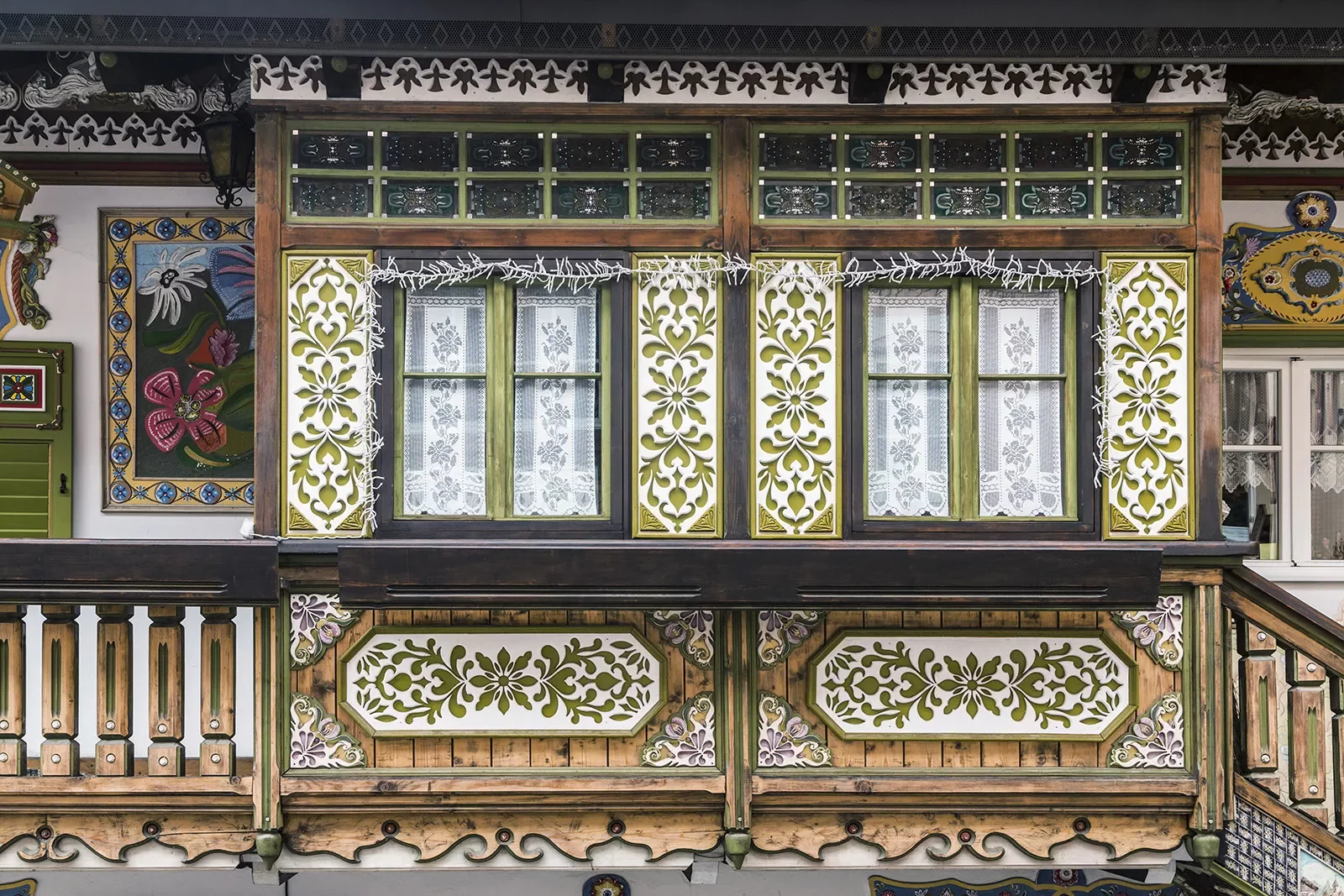 Rustic, artistic balcony with green and white flowers