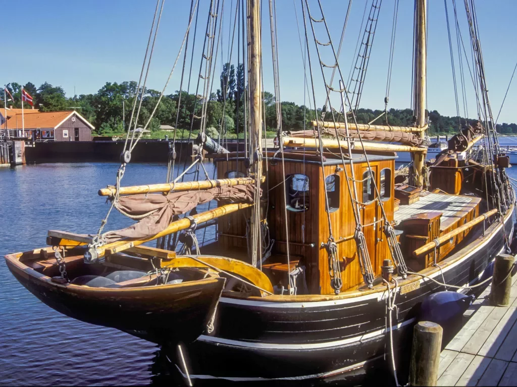 Small ship docked at a port 