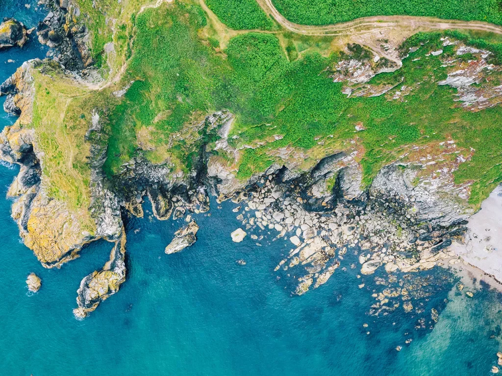 Sky view of a coast next to the ocean