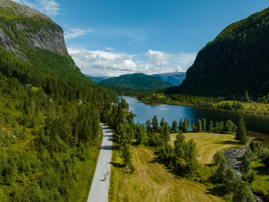 Bird's eye view of a rode winding through a river valley