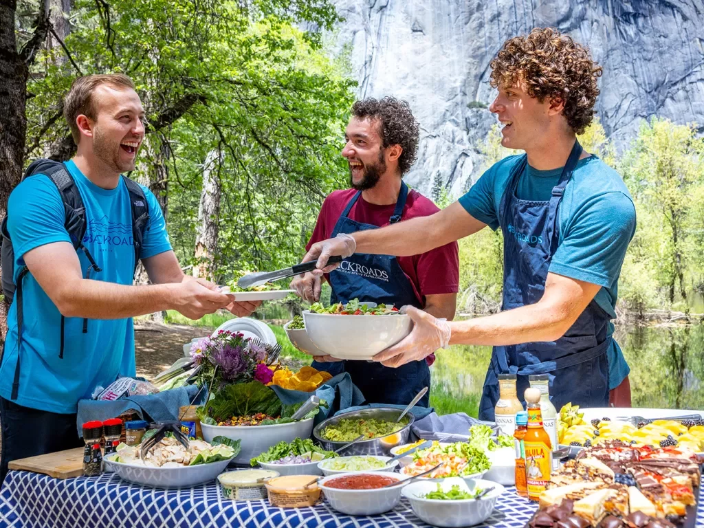 Backroads leaders serving a picnic