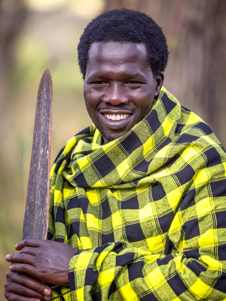  A man in a yellow coat smiling